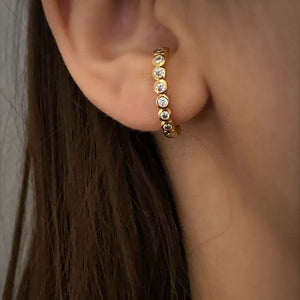 Gold curve earrings