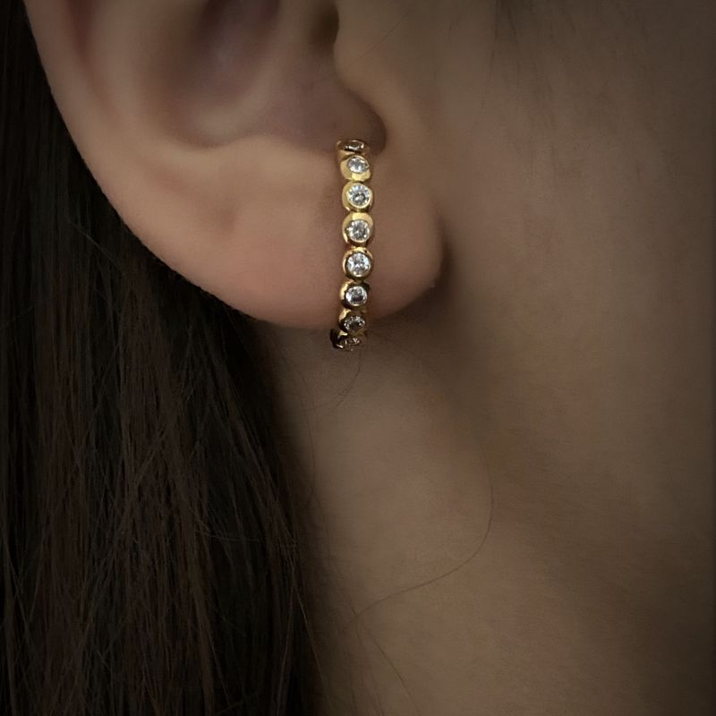 Gold curve earrings