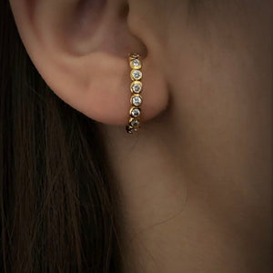 Gold curve earrings