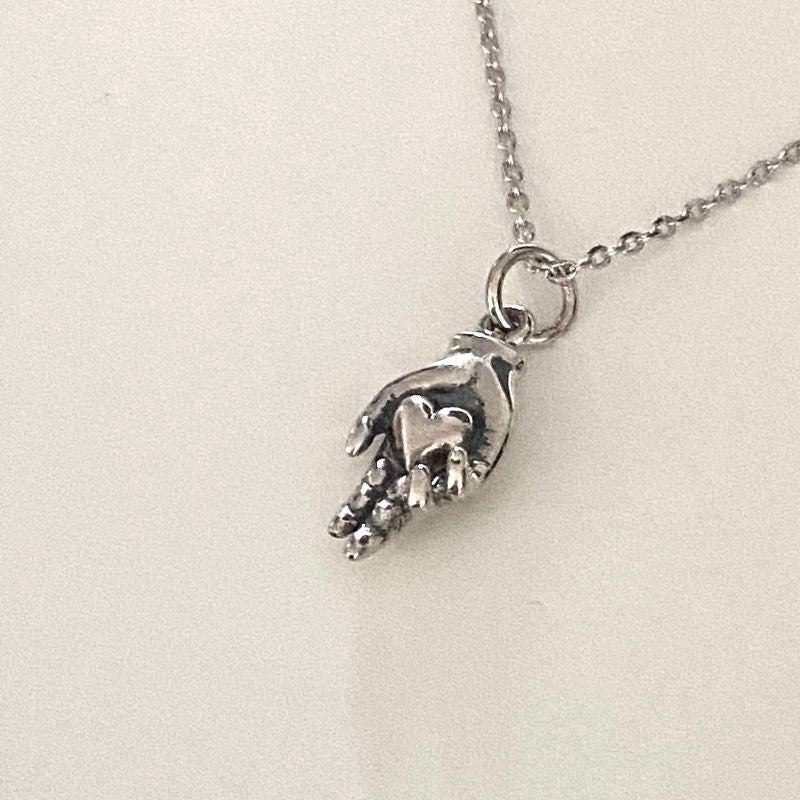Hand pendant,