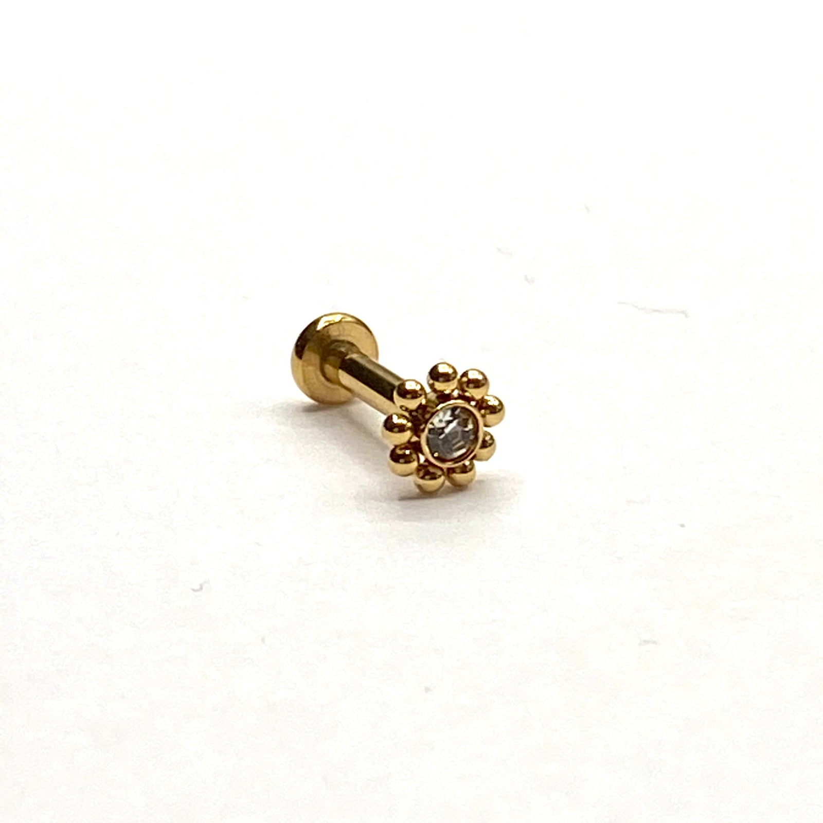 Flower Labret/Monroe piercing