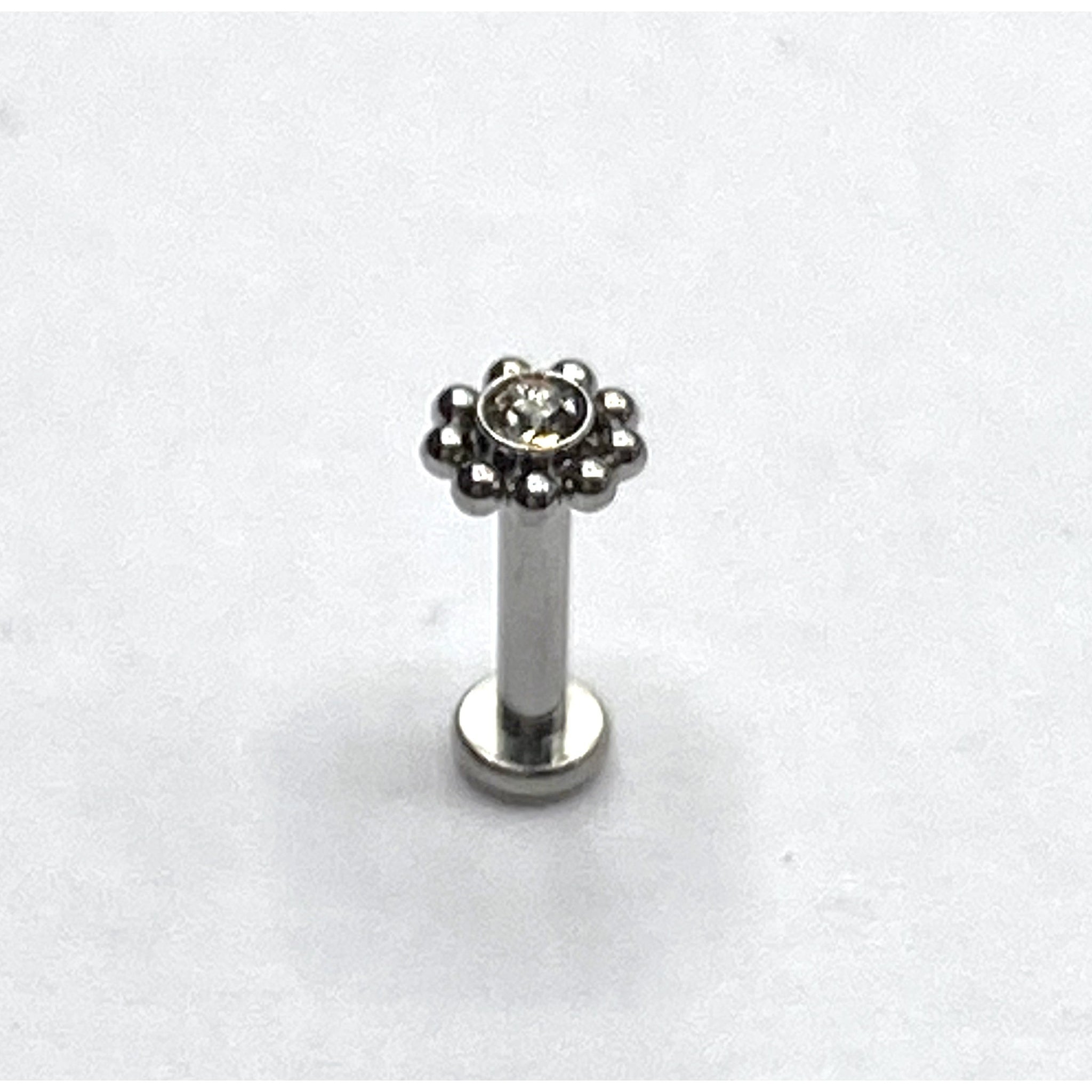 Flower Labret/Monroe piercing