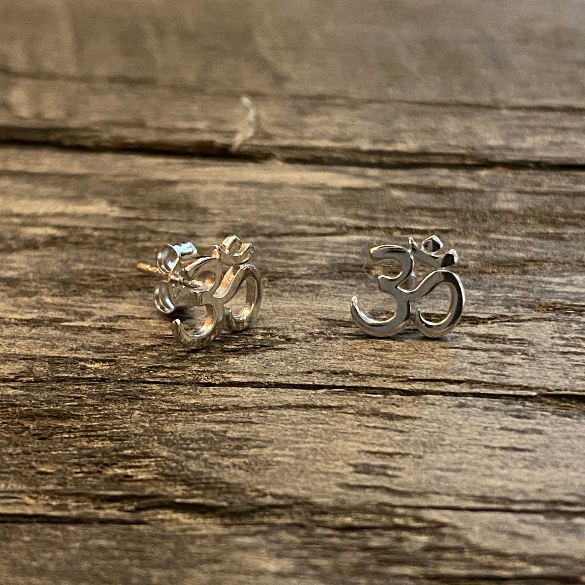 Ohm stud earrings