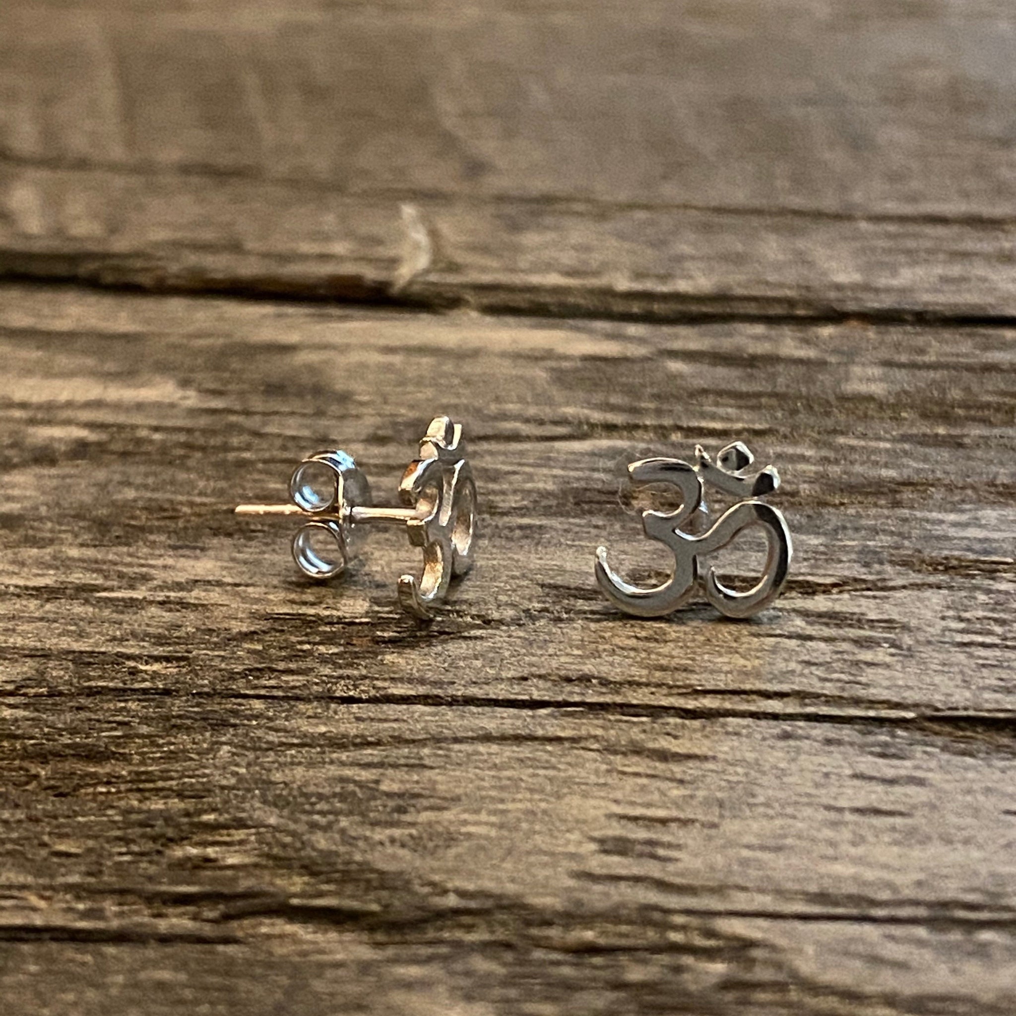 Ohm stud earrings