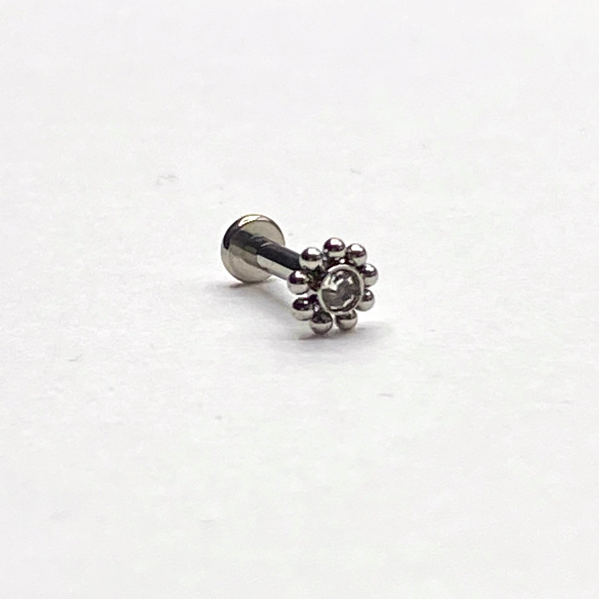 Flower Labret/Monroe piercing