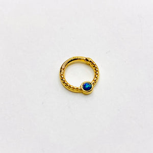 Gold opal septum clicker