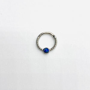Gold opal septum clicker