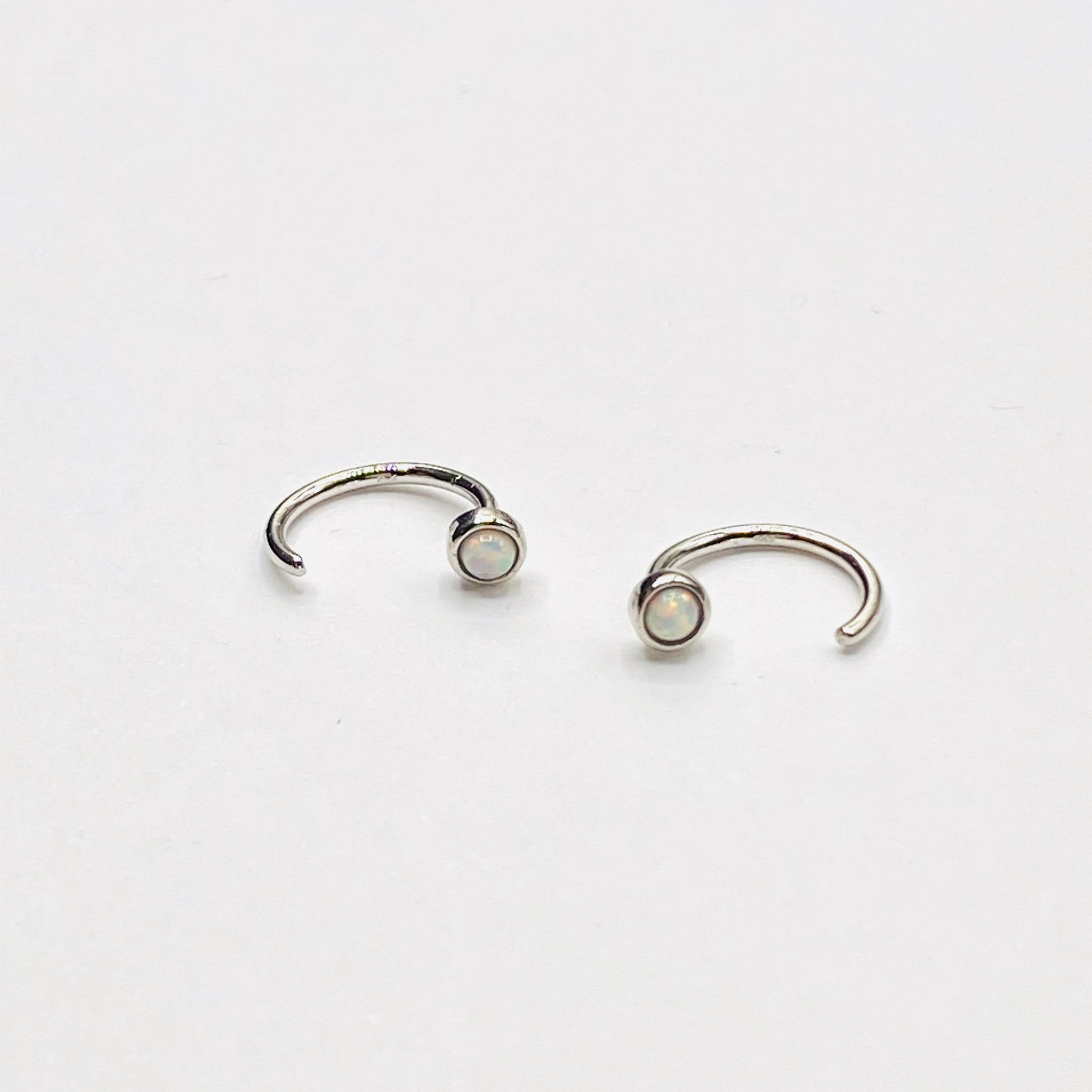 Opal huggie earring