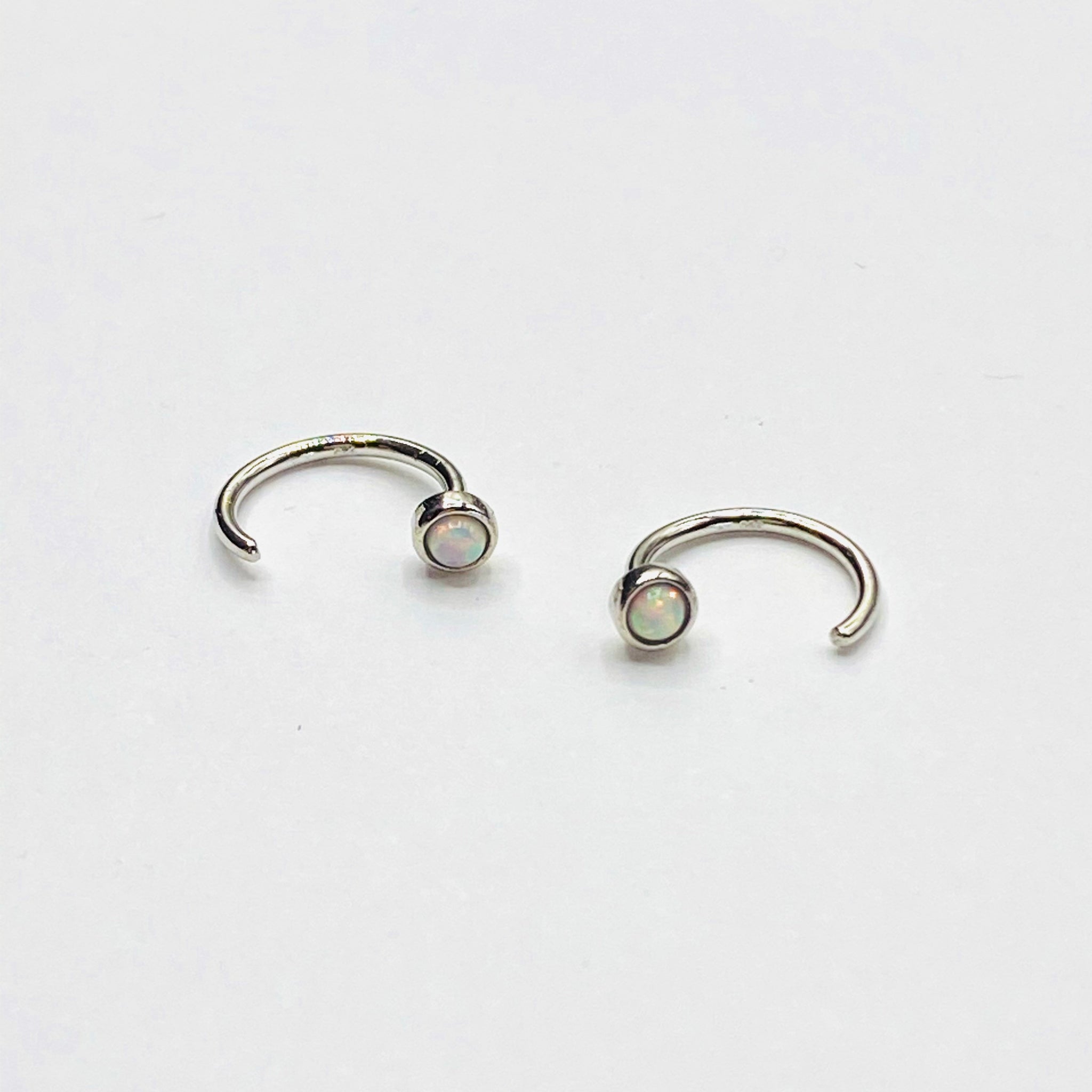 Opal huggie earring