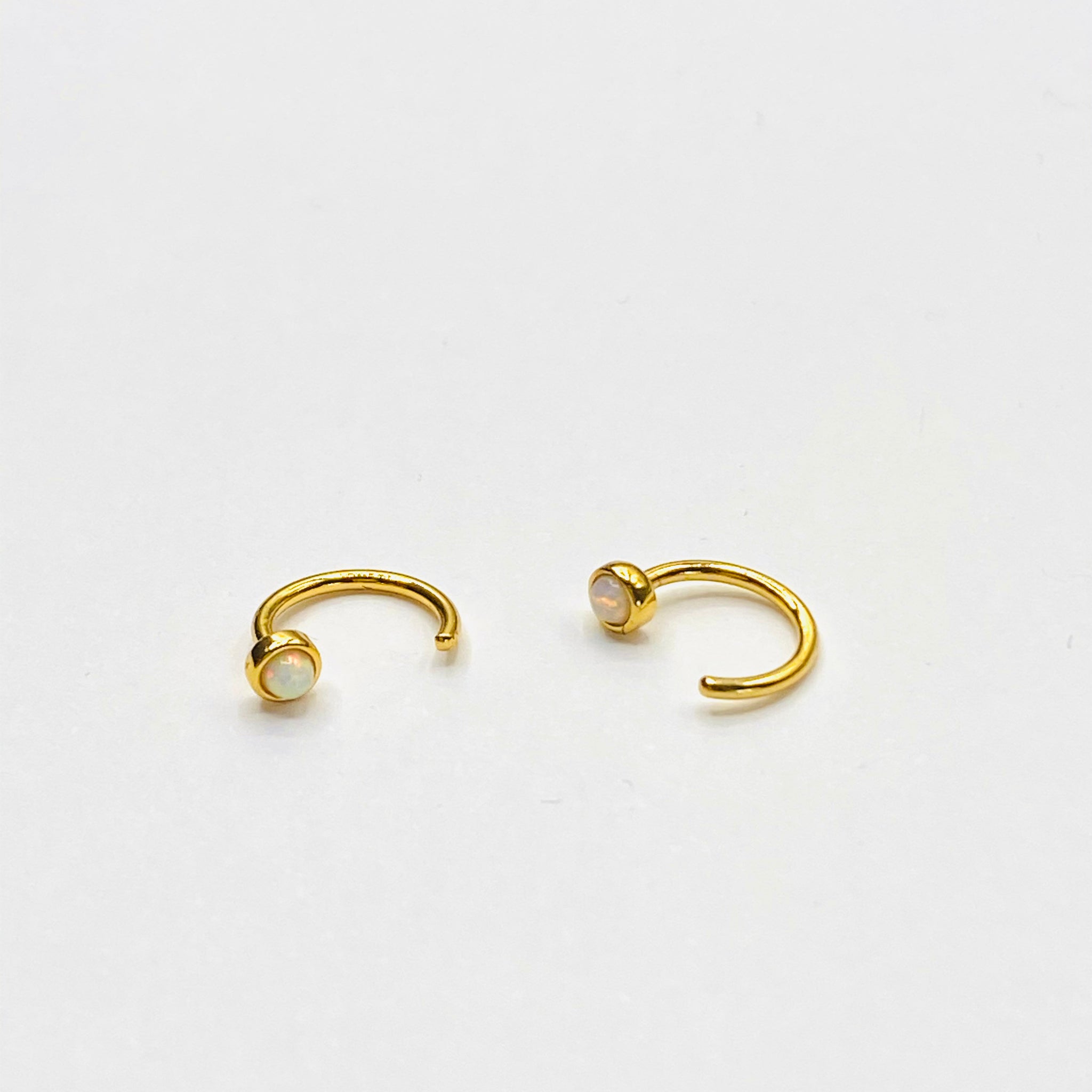 Opal huggie earring