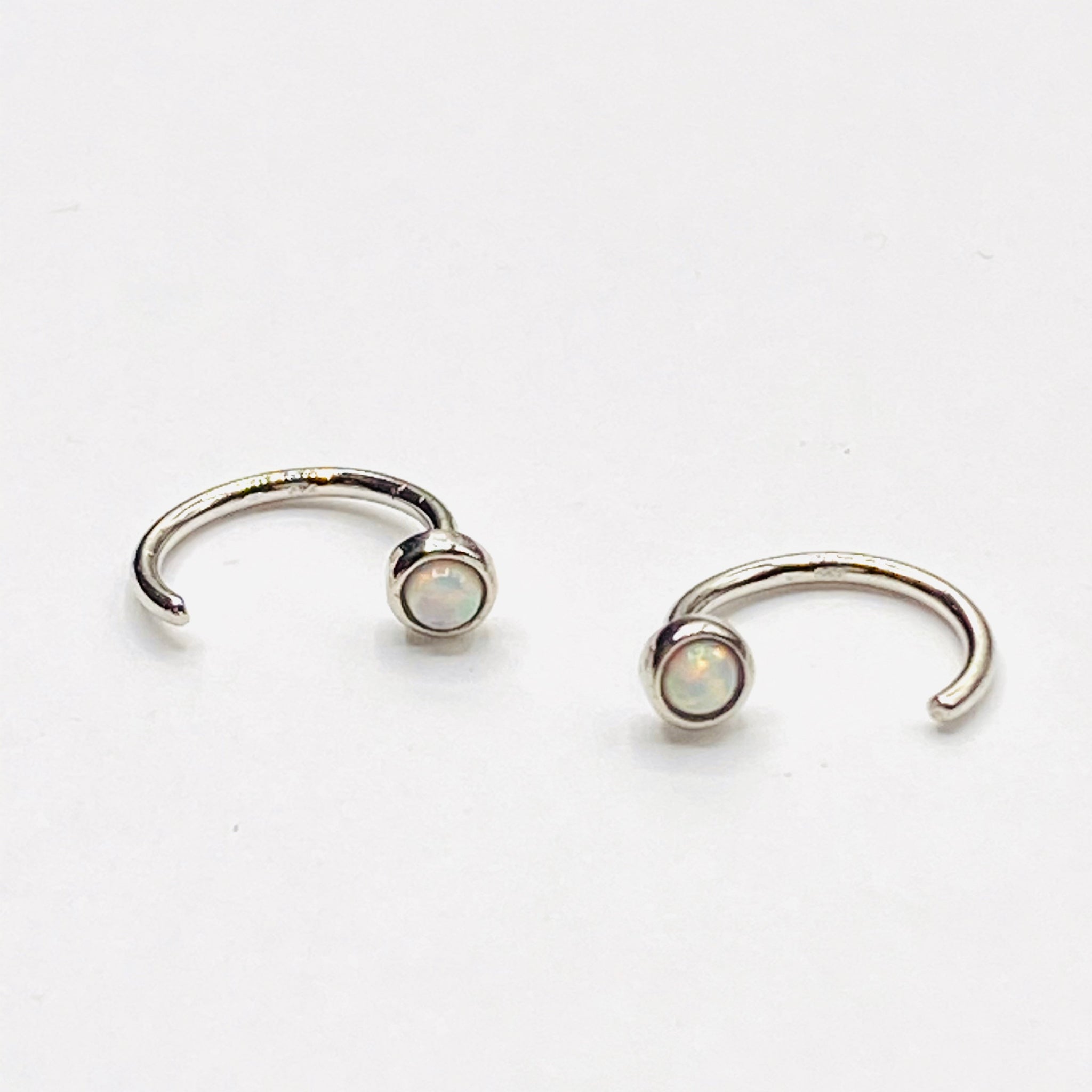 Opal huggie earring