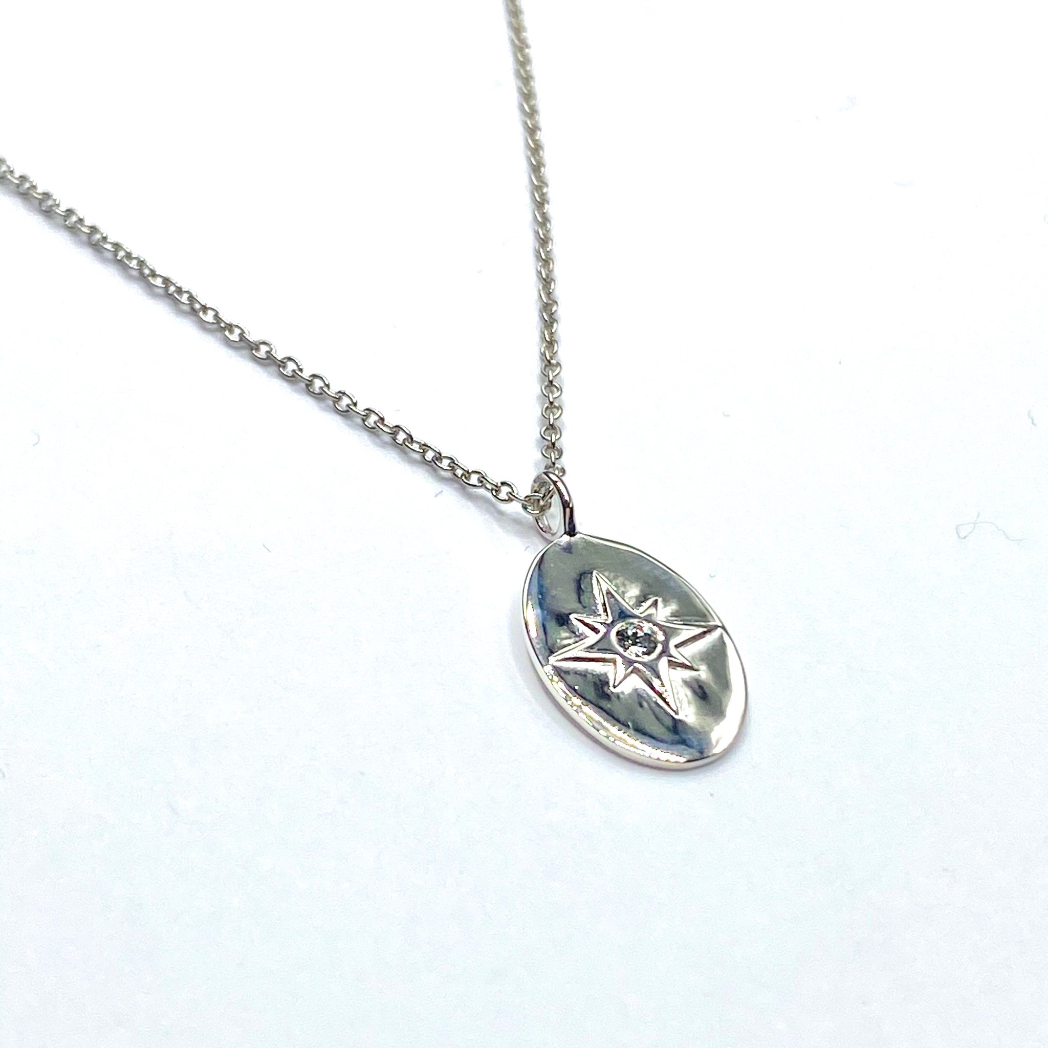 Oval star pendant