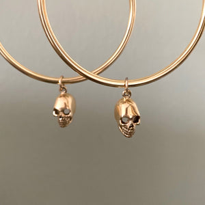 Large skull hoop earrings