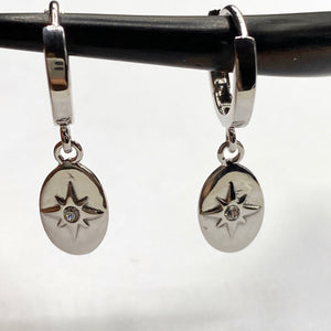 Oval star hoop earrings