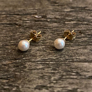 Tiny pearl stud earrings