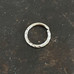 Cut  hinged segment ring