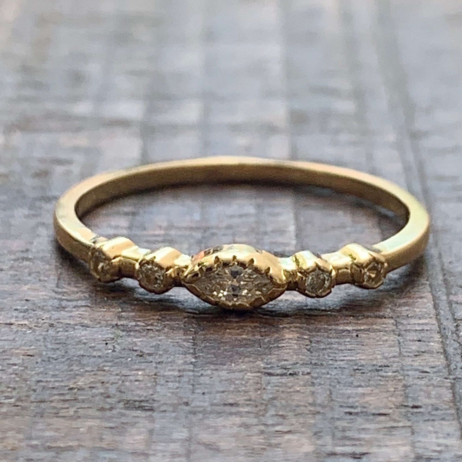 Halo solid gold ring with cubic zirconia